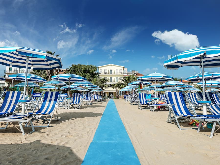 Private beach, white sand, sun-loungers, beach umbrellas