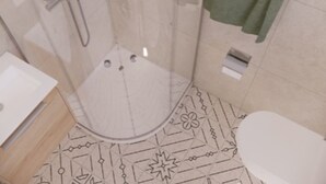 A bathroom with a shower, toilet, and sink. - Sea View Studio by Dominium (Dubrovnik)