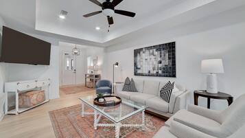 House, Multiple Beds, Patio, Garden View (The Orangery) | Living area | 50-inch flat-screen TV with cable channels