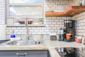 Fridge, microwave, stovetop, coffee/tea maker