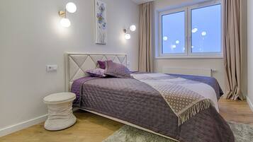 Desk, laptop workspace, blackout drapes, soundproofing