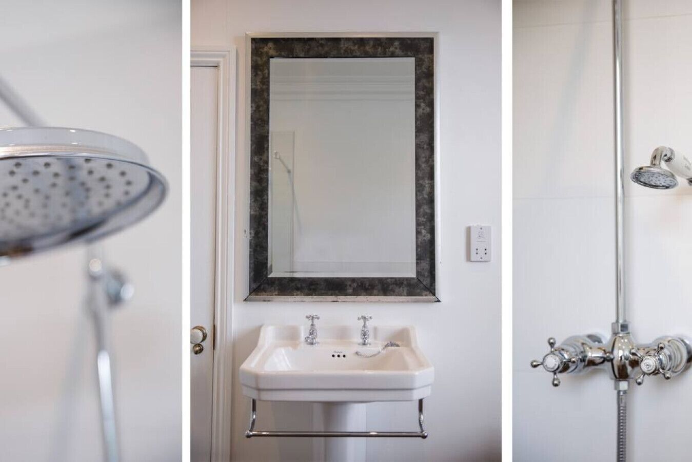 A bathroom with a shower, sink, and mirror.