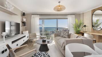 Premium Apartment | Living area | 42-inch LED TV with satellite channels