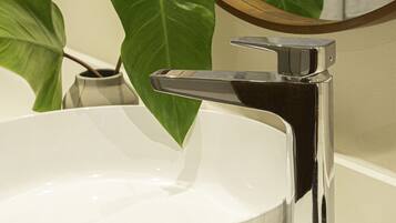 Hair dryer, towels, soap, shampoo