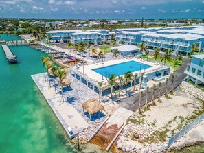 Exterior - Salty Air Retreat 1bed/2bath brand new condo in Ocean Isle Fishing village with shared pool (Marathon)