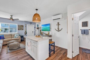 TV - Salty Air Retreat 1bed/2bath brand new condo in Ocean Isle Fishing village with shared pool (Marathon)