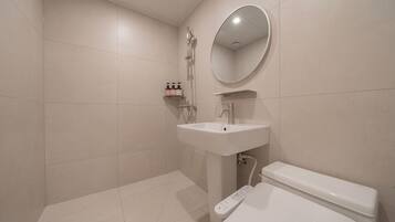 Standard Double Room | Bathroom | Shower, hair dryer, bathrobes, slippers