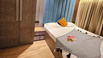 1 slaapkamer, een strijkplank/strijkijzer, wifi, beddengoed