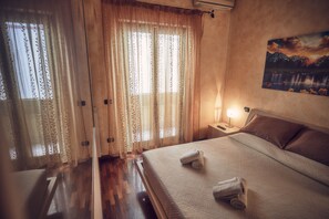Klassieke kamer, 1 twee- of 2 eenpersoonsbedden, 2 slaapkamers | Een strijkplank/strijkijzer, gratis wifi