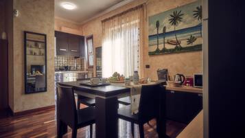 Classic Double or Twin Room, 2 Bedrooms | Living area | Flat-screen TV