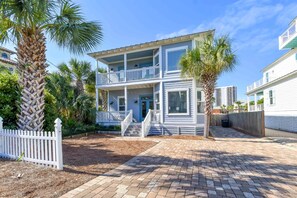 A two-story beachfront property with a balcony, a covered porch, and a brick pathway. - Coastal Home w/Private Pool & Volleyball Court! ππ¦πΊ (Miramar Beach)