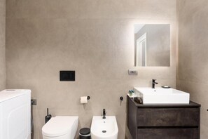 Hair dryer, towels, soap, shampoo