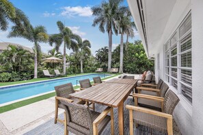 A heated pool - Pet-Friendly Inland Home | Resort Style Yard & Pool (Marco Island)