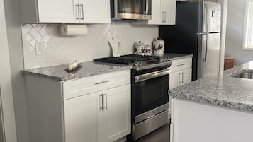 Fridge, microwave, coffee/tea maker, blender