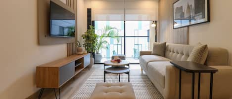 Apartment, 2 Bedrooms (204) | Living area | 40-inch Smart TV with cable channels