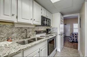 Fridge, microwave, oven, cookware/dishes/utensils