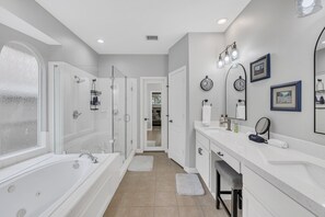 Jetted bath, hair dryer, towels, soap