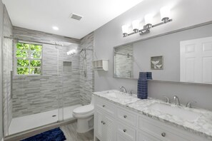 Shower, hair dryer, soap, shampoo