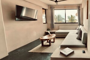Premier Apartment, 2 Bedrooms, Air conditioning, Ocean View | Living area | 55-inch Smart TV with digital channels - Casa Leah Puerto Escondido (Puerto Escondido)