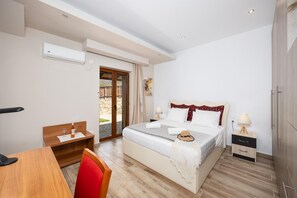 2 dormitorios, tabla de planchar con plancha, cuna de viaje y wifi