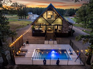 Outdoor pool, a heated pool - Insta-Worthy Cabin w/Heated Pool/Hot Tub/Arcade/Slide/Foosball/Swings/Fire Pit (Broken Bow)