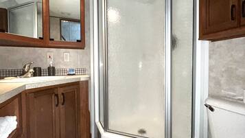 Shower, towels, soap, shampoo