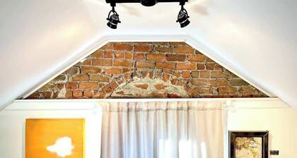Restored 1890s Carriage House | Walk To Downtown