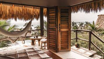 Habitación romántica | Vista a la playa o el mar