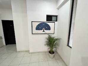 Family Double Room | Living area | Flat-screen TV, heated floors - HOTEL BOUTIQUE ARBOL DE LA VIDA (Taxco)