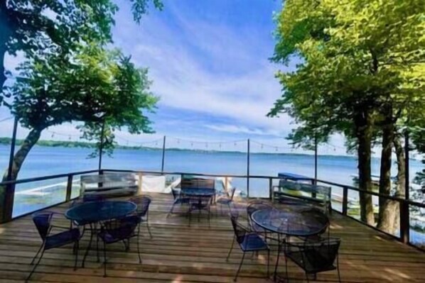 Enjoy dining or socializing on the deck with scenic views of the surrounding water.