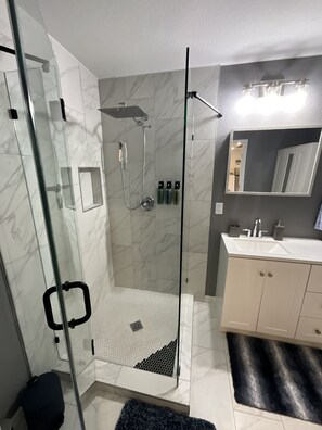 Shower, hair dryer, towels, soap