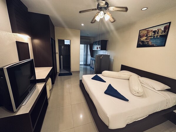 Business Condo, City View | 1 bedroom, blackout curtains, soundproofing, iron/ironing board - Navanakorn Aomsin Hotel near Big C Super (Khlong Luang)