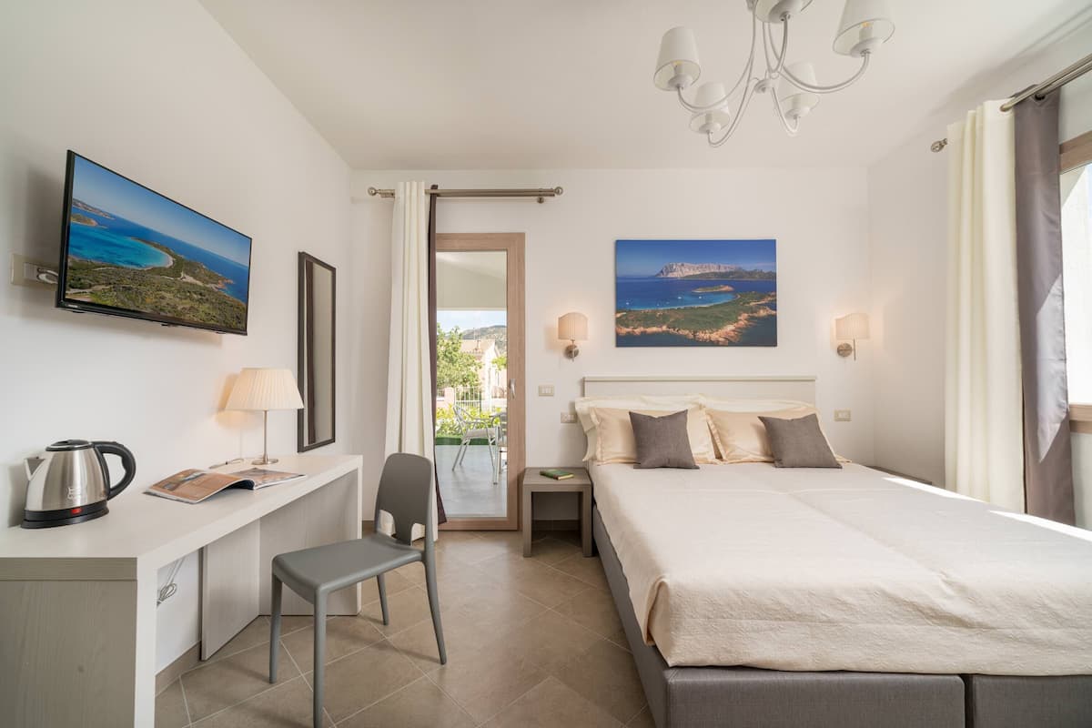 Comfort kamer, uitzicht op tuin, op benedenverdieping | 1 slaapkamer, luxe beddengoed, donzen dekbedden, een kluis op de kamer