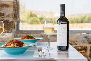 Breakfast, lunch, dinner served; Greek cuisine, pool views 