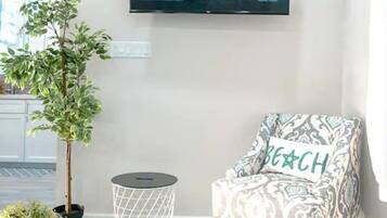 Basic Villa | Living area | Flat-screen TV