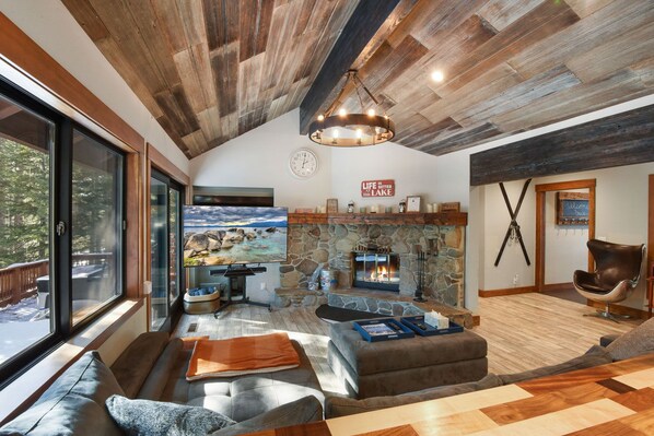 Smart TV, fireplace, table football, books