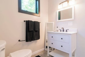 Shower, hair dryer, shampoo