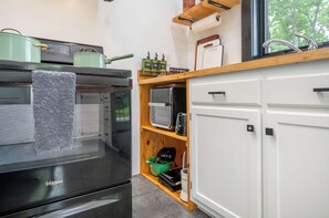 Air fryer, panini press, blender, toaster, strainer, and mixer.