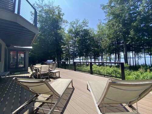 Luxurious lakefront home with 750' of spectacular frontage on Great Pond