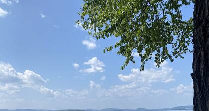 Luxurious lakefront home with 750' of spectacular frontage on Great Pond