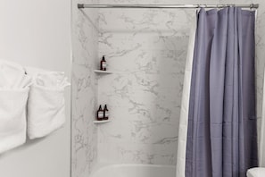 Hair dryer, towels, soap, shampoo