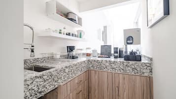 Microwave, stovetop, coffee/tea maker, toaster