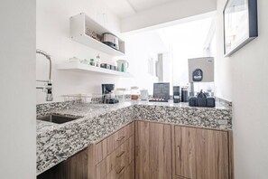 Microwave, stovetop, coffee/tea maker, toaster