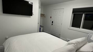 Habitación Deluxe | 1 dormitorio, ropa de cama de alta calidad, wifi gratis y ropa de cama