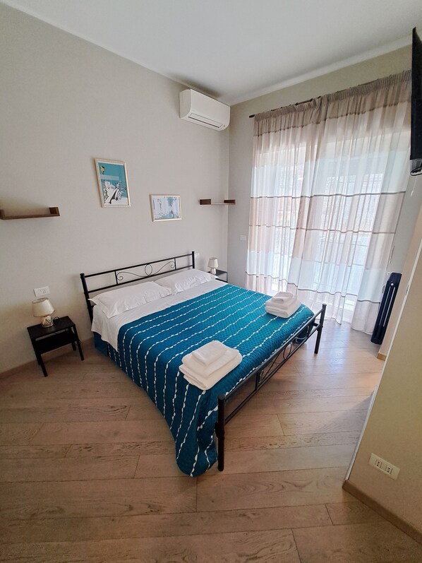 2 bedrooms, in-room safe, iron/ironing board, travel cot