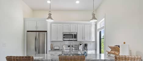 Coffee/tea maker, fridge, microwave, oven
