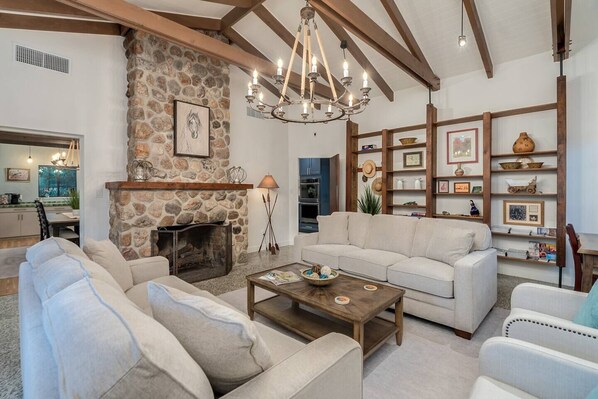 Smart TV, fireplace, books