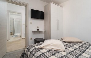 1 Schlafzimmer, Reisekinderbett, kostenloses WLAN, Bettwäsche
