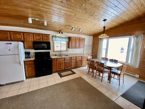 Fridge, oven, toaster, cookware/dishes/utensils