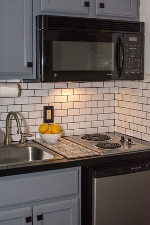 Fridge, microwave, stovetop, coffee/tea maker